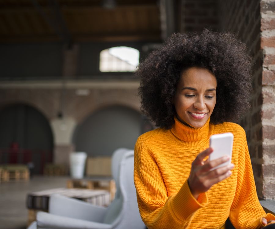 Young woman engaged on her mobile device